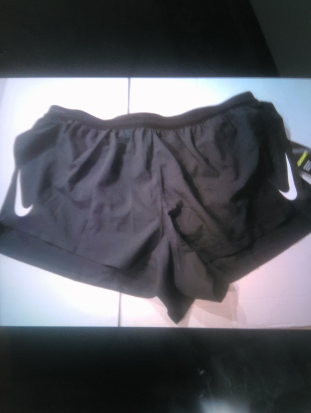 Nike Women’s Black Athletic Shorts with White Swooshes